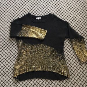 Black sweater “dipped” in gold